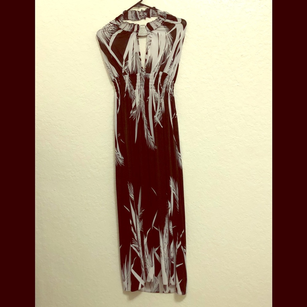 Maxi Dress with rhinestone in center.